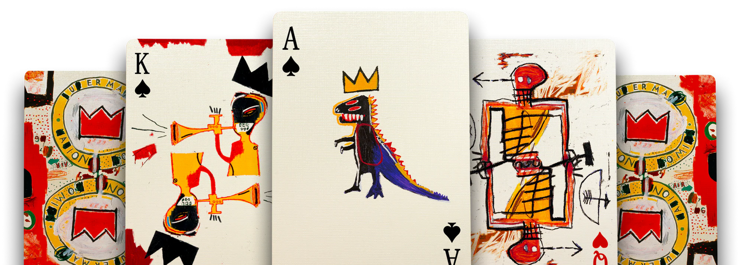 Set of playing cards with colorful designs of Jean-Michel Basquiat on a white background